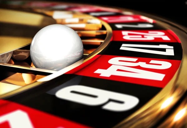 Live roulette table with spinning wheel and betting layout
